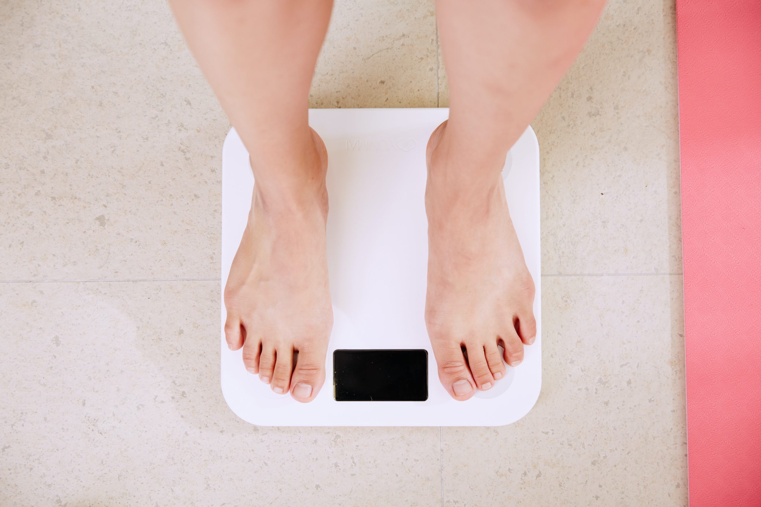 obesity image person on scales